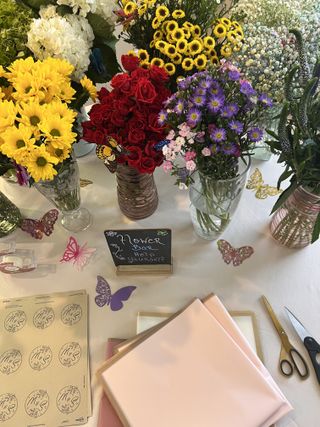 Vibrant flower bar station with mixed seasonal blooms